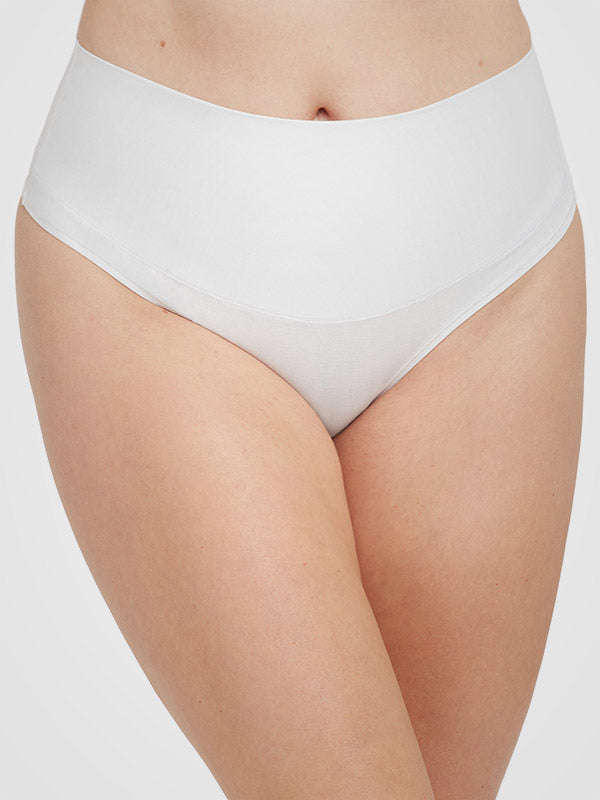 Spanx koreguojančios medvilnės ir modalo kelnaitės stringai "Cotton Comfort White"