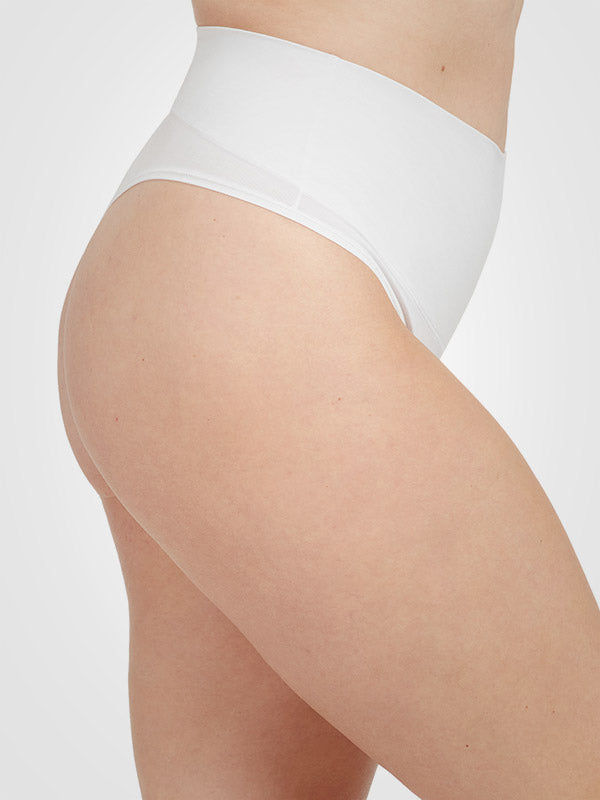 Spanx koreguojančios medvilnės ir modalo kelnaitės stringai "Cotton Comfort White"