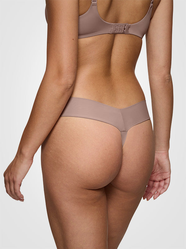 Triumph besiūlės kelnaitės stringai "Body Make Up Illusion EX Dark Pink"