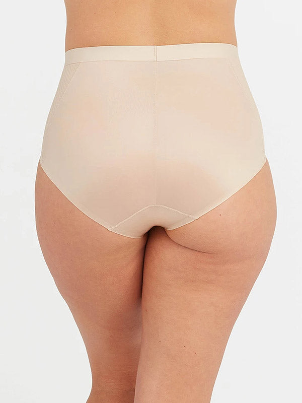 Spanx koreguojančios aukšto juosmens kelnaitės "Thinstincts® Nude"
