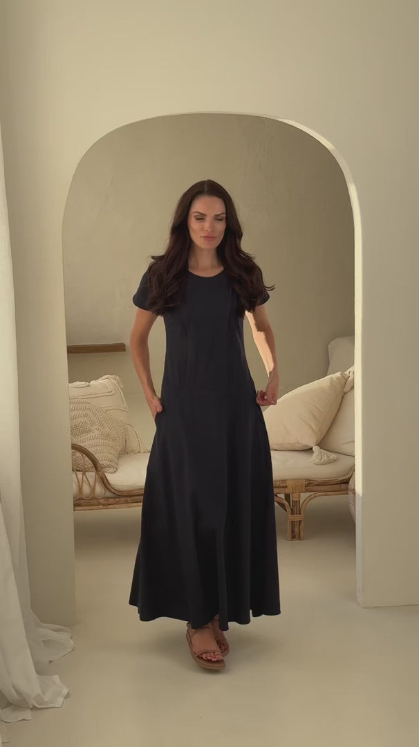 Load video: a formos lininė suknelė